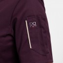 Logo Robur brodé sur la manche de la veste unera Prune avec finition